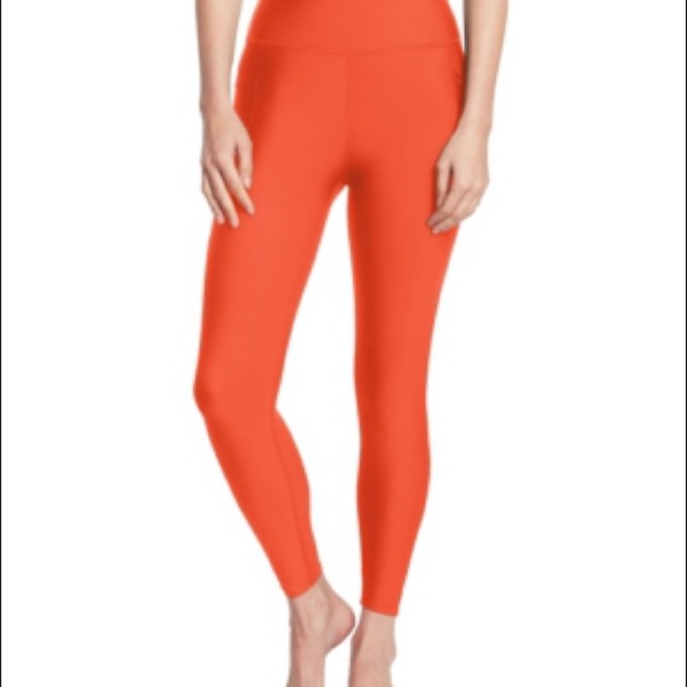 Size S bright orange leggings by Sage Collective
